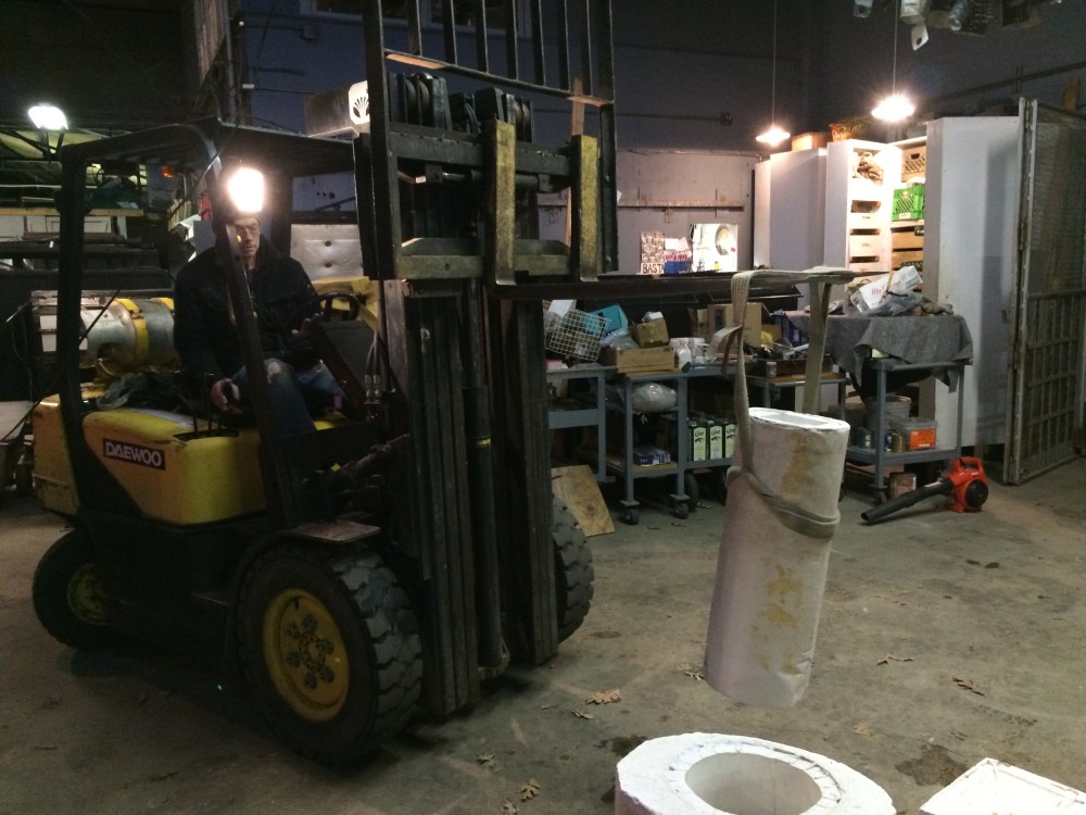 Hank is an expert with the fork lift!