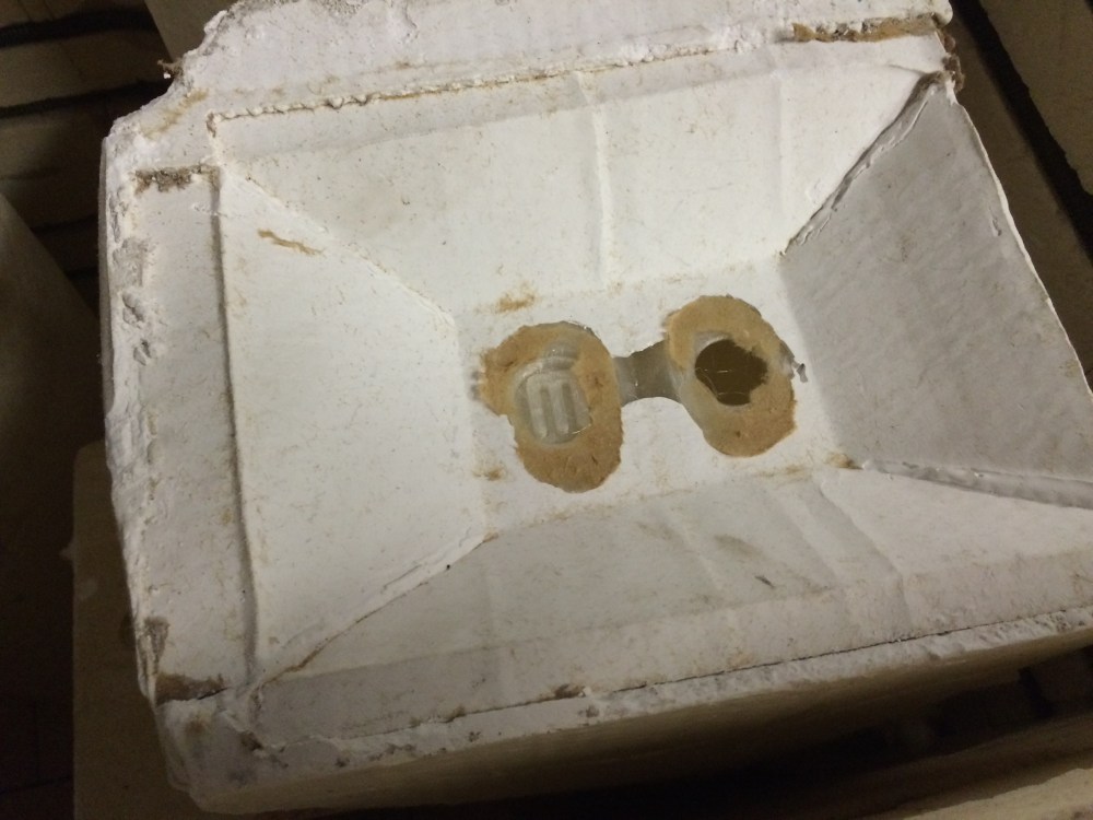 There's the bottom of the  Zee figurine. 