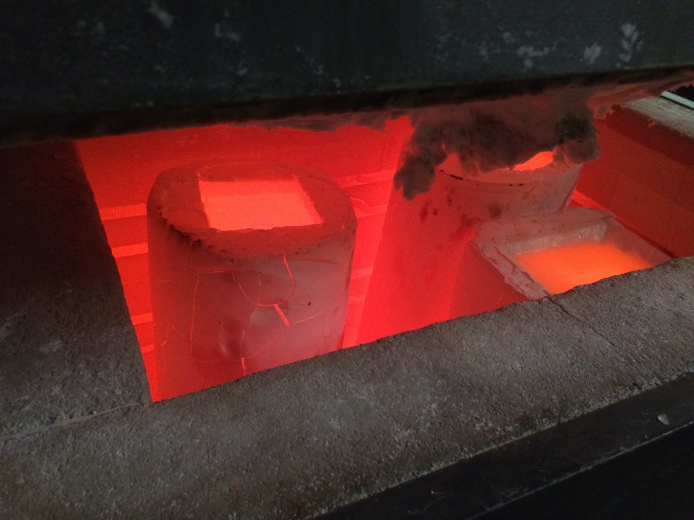 Finally, the glass stopped flowing and I knew the molds were full. 