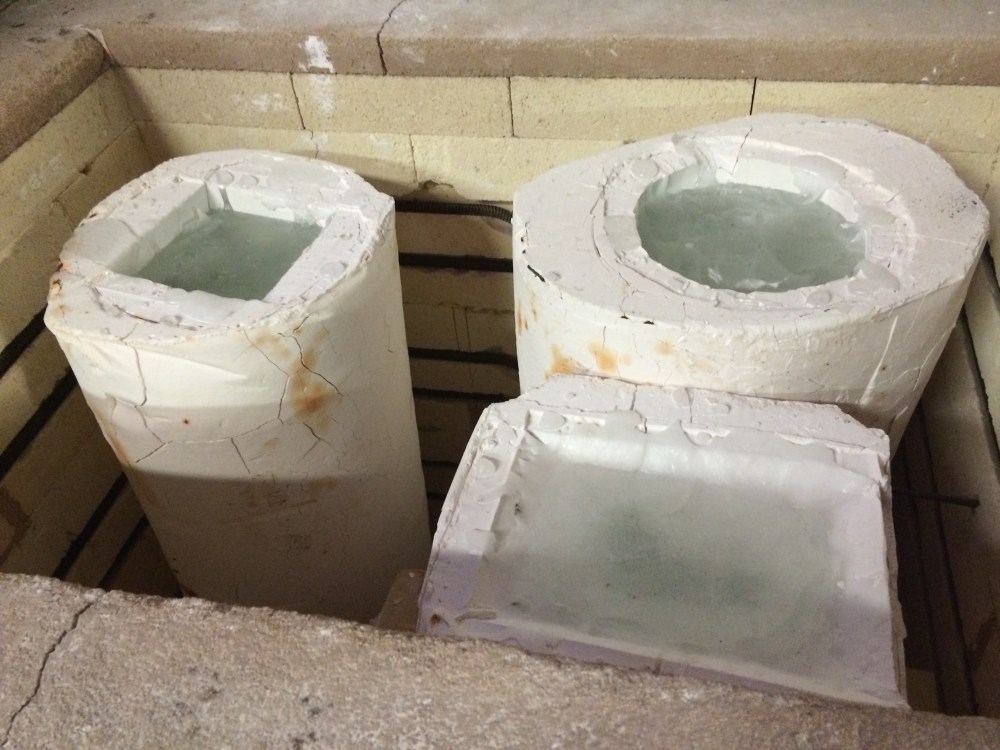 The pieces took about ten days to cool down. Annealing glass involves soaking it at particular strain temperatures, then slowly cooling it down to room temp. I left and returned in two weeks to find this. 