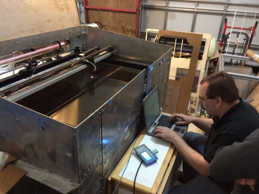 Before I left he had to cut a couple last minute plexiglass parts on his homemade laser cutter, built into a surplus Navy shipping container
